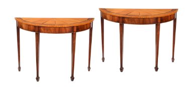 A pair of satin walnut side tables in George III style