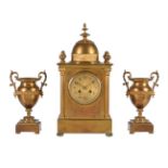 A French gilt brass mantel clock garniture