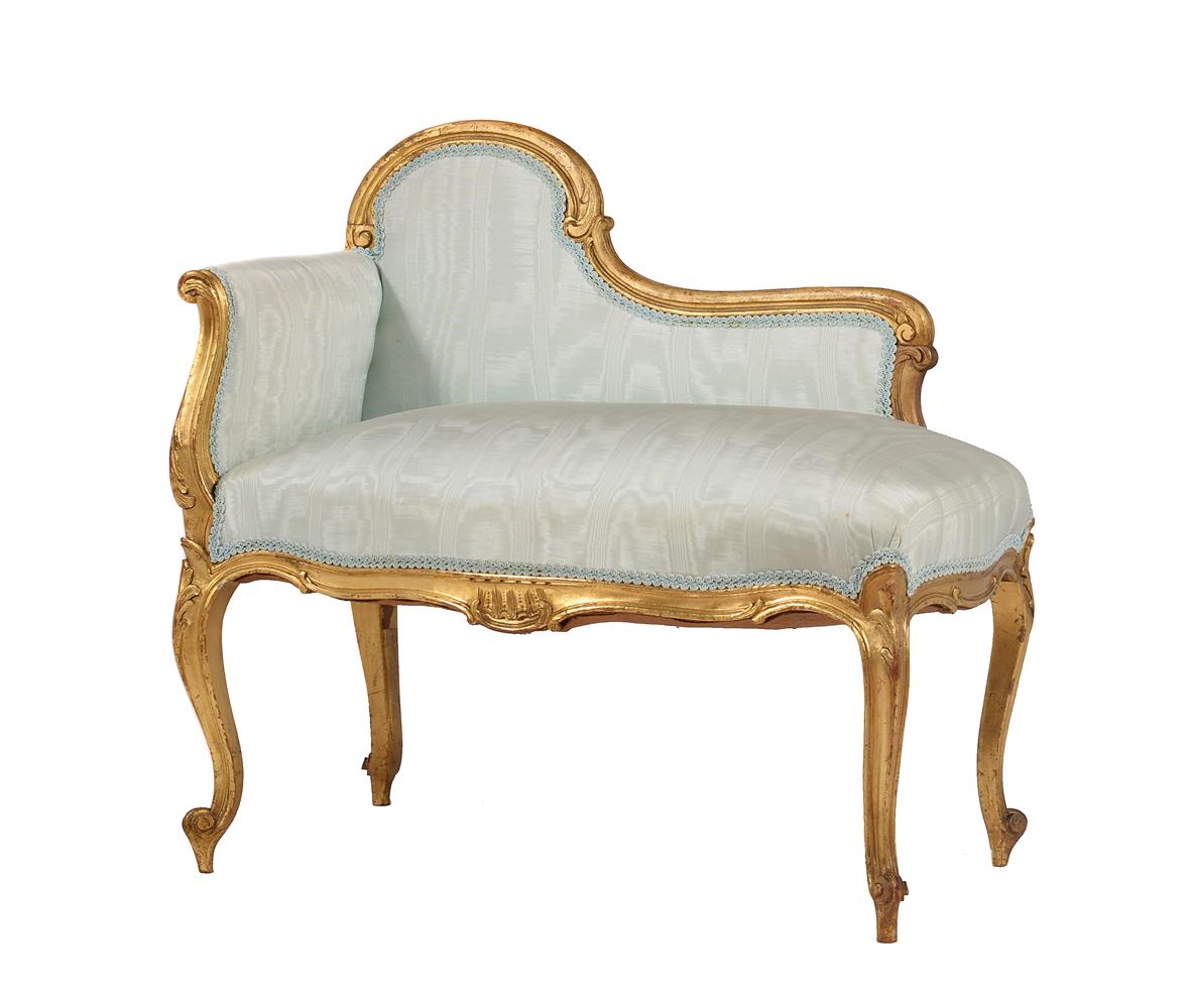 A French giltwood and watered silk upholstered window seat in Louis XV style