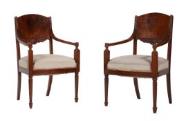 A pair of Russian mahogany armchairs