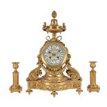 A French gilt brass mantel clock in Louis XV style