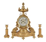 A French gilt brass mantel clock in Louis XV style