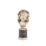 An Italian plaster bust of a cherub