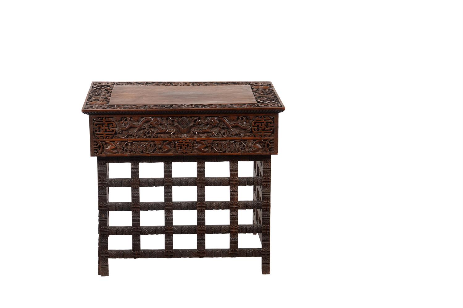A Chinese carved hardwood rectangular table