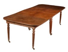 A Regency mahogany dining table