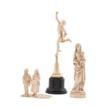 Y A collection of three carved ivory figures