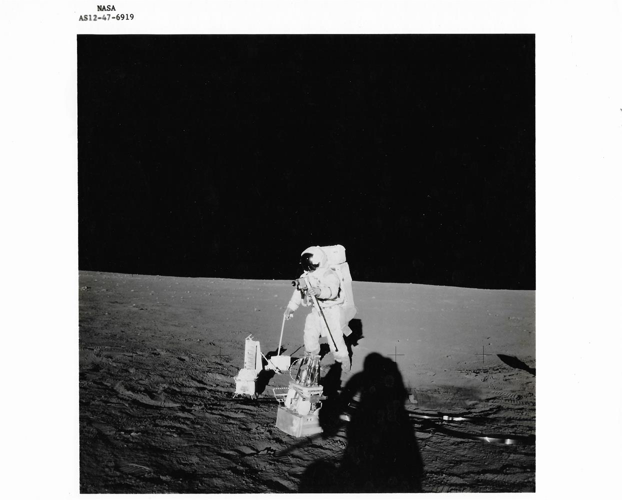 Diptych: Charles Conrad holds the US flag; Alan Bean deploys ALSEP, Apollo 12, 14-24 Nov 1969 - Image 4 of 4