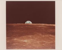 Earth emerging over lunar horizon, rare and unreleased view, Apollo 11, 16-24 Jul 1969