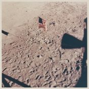 The view of the U.S. flag from the 'Eagle's' window after the moonwalk, Apollo 11, 16-24 Jul 1969