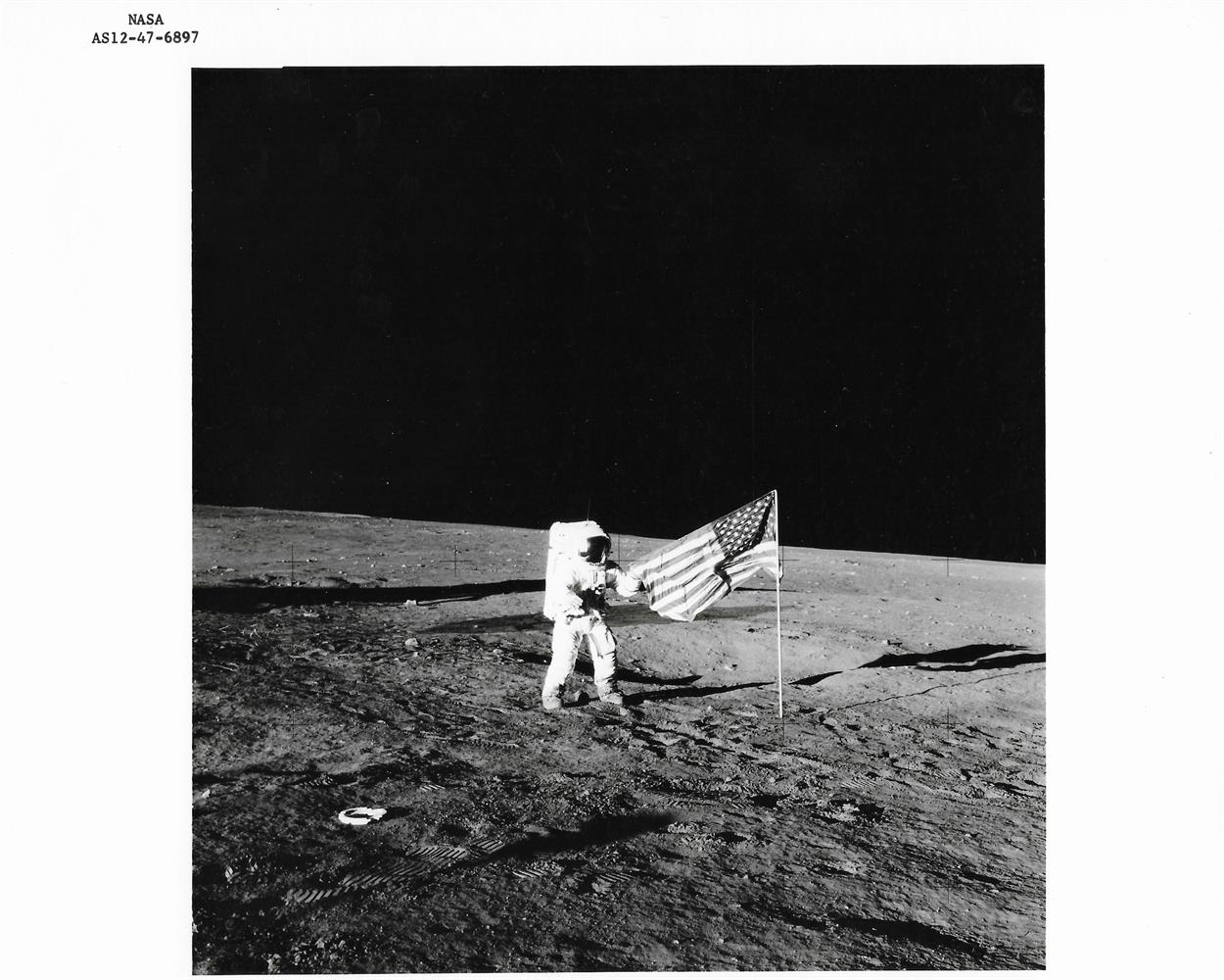 Diptych: Charles Conrad holds the US flag; Alan Bean deploys ALSEP, Apollo 12, 14-24 Nov 1969 - Image 2 of 4