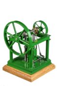 A well-engineered model of an over-type vertical live steam engine