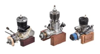 Three vintage model two-stroke petrol engines
