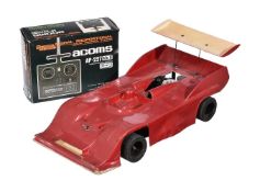 A rare PB Racing Products PB6 RC nitro racing car with Can-Am style GT body