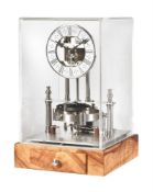 An exhibition standard 'model engineer' built Electric Motor Clock in a Skeleton Clock Style