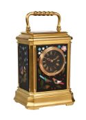 A RARE FRENCH GILT BRASS MINIATURE CARRIAGE TIMEPIECE WITH FINE FLORENTINE PIETRA-DURA PANELS