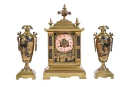 A FRENCH GILT BRASS MANTEL CLOCK GARNITURE IN THE CHINESE TASTE WITH MUTLI-COLOUR RELIEF PANELS