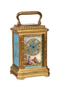 A FINE FRENCH ENGRAVED GILT BRASS PORCELAIN PANEL INSET MINIATURE CARRIAGE TIMEPIECE