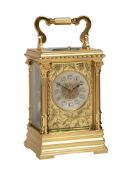 A FRENCH GILT BRASS CASED CARRIAGE CLOCK WITH PUSH-BUTTON REPEAT