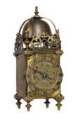 AN INTERESTING BRASS MINIATURE HOUR-STRIKING LANTERN CLOCK WITH ALARM