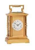 A FINE FRENCH GILT BRASS REPEATING CARRIAGE CLOCK INSET WITH LIMOGES ENAMEL PANELS