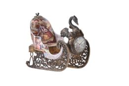 A FINE AUSTRIAN ENGRAVED SILVER-GILT AND ENAMELLED NOVELTY SLEIGH TIMEPIECE