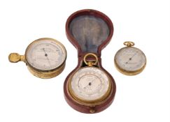 THREE GILT BRASS ANEROID POCKET BAROMETERS WITH ALTIMETERS