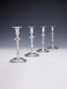 A SET OF FOUR LATE GEORGE II CAST SILVER CANDLESTICKS, ALEXANDER JOHNSTON