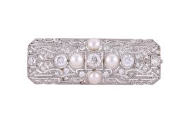 AN EARLY 20TH CENTURY BOUTON PEARL AND DIAMOND BROOCH, CIRCA 1920