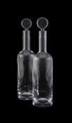 BACCARAT, A PAIR OF DECANTERS AND STOPPERS