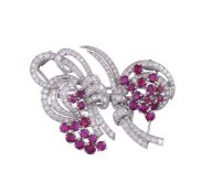 GARRARD, A MID 20TH CENTURY RUBY AND DIAMOND DOUBLE CLIP BROOCH CIRCA 1950