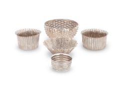 FIVE SILVER COLOURED BOWLS, CLARE RANSOM