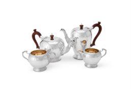 A SILVER ROUNDED FOUR PIECE TEA AND COFFEE SERVICE, C. J. VANDER LTD