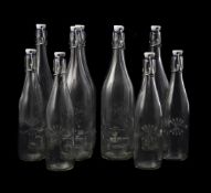 SIX LARGE GLASS WATER BOTTLES OF KILNER TYPE
