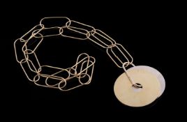IBU, A FRENCH MODERNIST GOLD COLOURED DISC NECKLACE