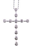 DE BEERS, AN 18 CARAT GOLD DIAMOND CROSS PENDANT