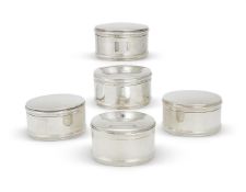 FIVE SILVER PLATED PLAIN CIRCULAR HINGED BOXES, RALPH LAUREN