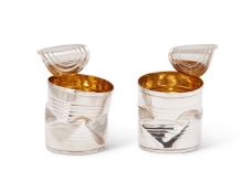 A PAIR OF SILVER NOVELTY CRUSHED CAN BEAKERS, REBECCA JOSELYN