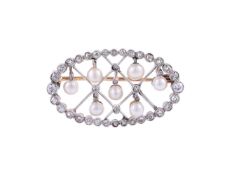 AN EARLY 20TH CENTURY DIAMOND AND PEARL LATTICE BROOCH, CIRCA 1910