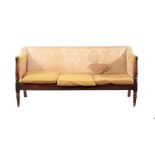 A mahogany and upholstered sofa