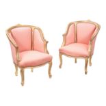 A pair of giltwood and upholstered bergère armchairs