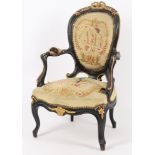 A Victorian ebonised and parcel gilt child's fauteuil