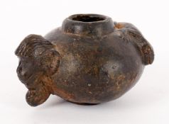A Chinese bronze pot with monkey head and lizard