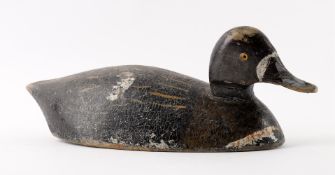 A 19th century carved wood duck decoy