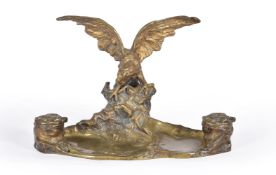 After Albert Marionnet (1852-1910), a bronze desk stand mounted with an eagle