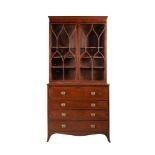 A George III mahogany, satinwood banded and box strung secretaire bookcase,