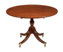 A mahogany centre table in George III style