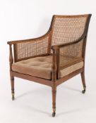 A mahogany bergere library armchair