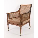 A mahogany bergere library armchair