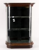A late 19th/early 20th century mahogany and glazed bowfront table top shop display cabinet