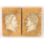 After The Antique- a pair of relief carved profiles of Roman Emperors